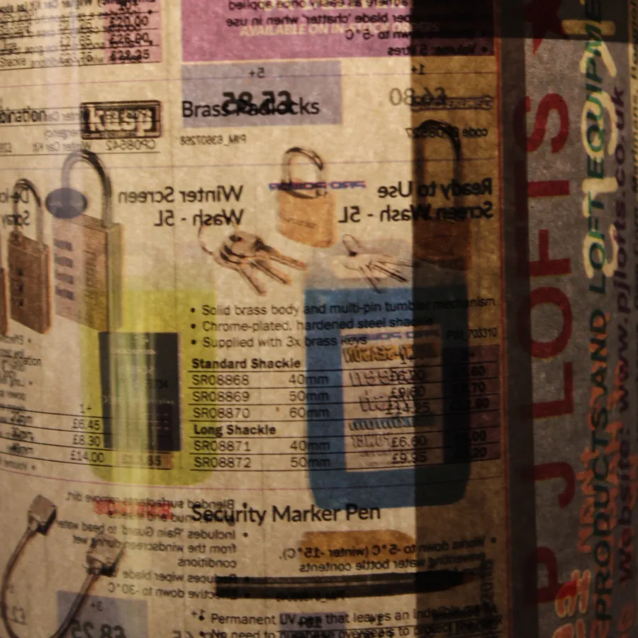 Detail of work by Cillian Finnerty feating a close up of custom lampshade made from magazine page advertising locks and various other hardware.